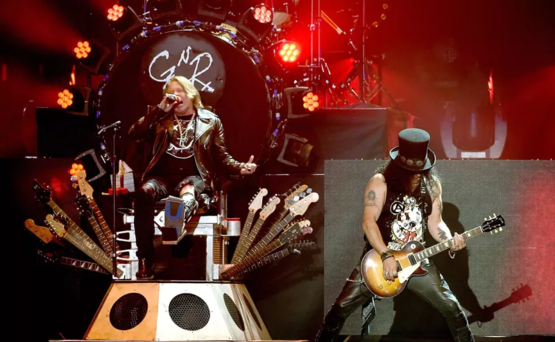 Image: On-and-off bandmates Axl and Slash are on the road again and coming to Dallas on Sept. 1. We look back at Use Your Illusion, 30 years later.