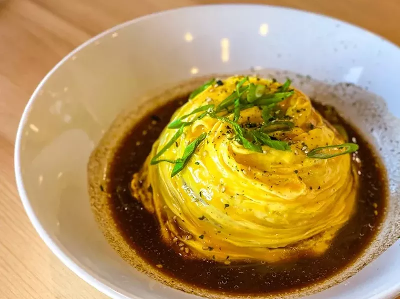 Image: Omurice, rice topped with a tornado omelet, at Okaeri Cafe.