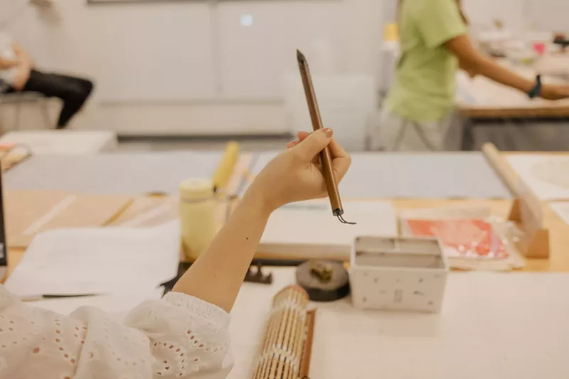 Image: The history of Asian Americans in Dallas is told through their cuisine at a new exhibition.