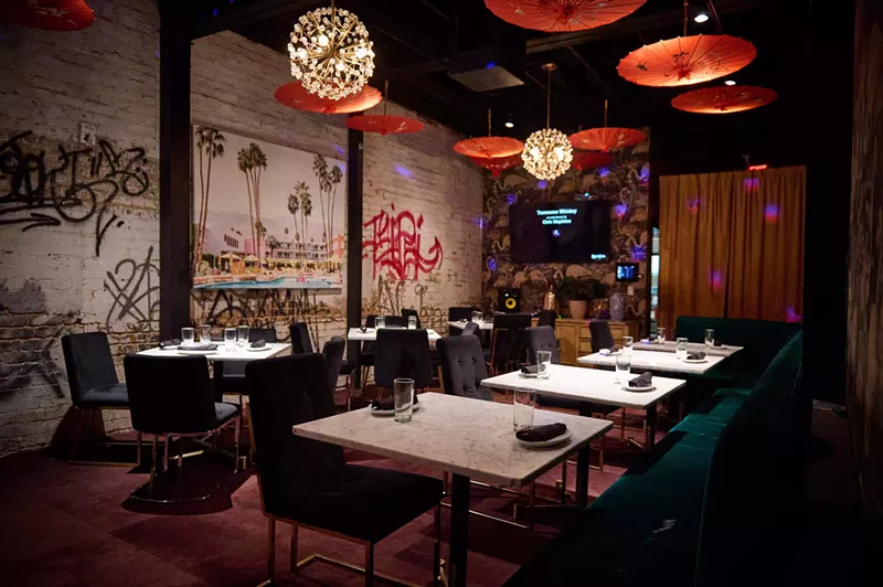 Image: Alice is a cozy neighborhood restaurant with elegant touches, a marble bar and spray paint on the walls.