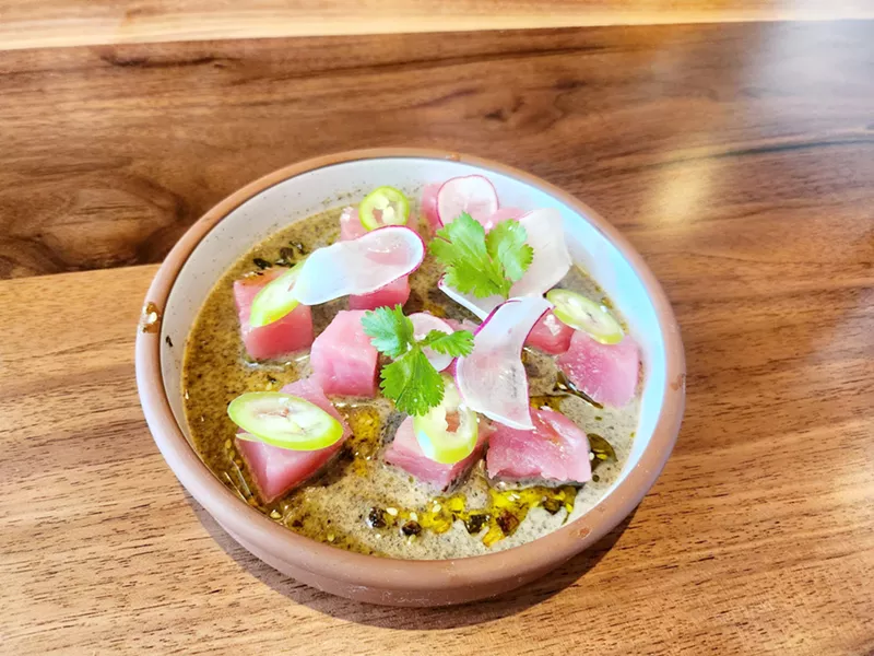 Image: UnaVida's gluten-free Crudo De Atun with ahi tuna, macha verde, jugo verde and aguachile.