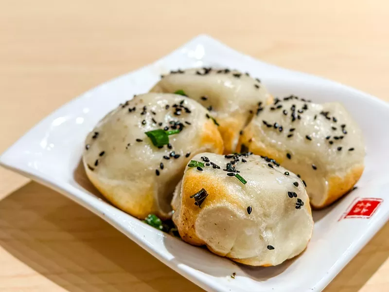 Image: Shen jian bao: pan-fried pork soup dumplings.
