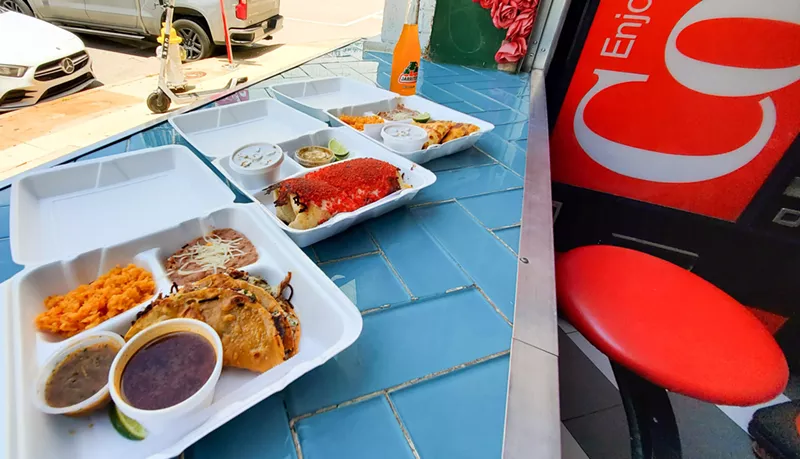 Image: Grab a seat at the bar at Taco City to enjoy Cheeto-dusted burritos.