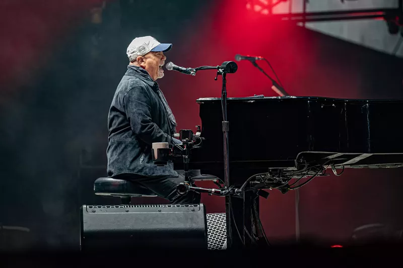 Image: Billy Joel at the piano onstage in Dallas./