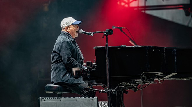 Billy Joel at the piano onstage in Dallas./