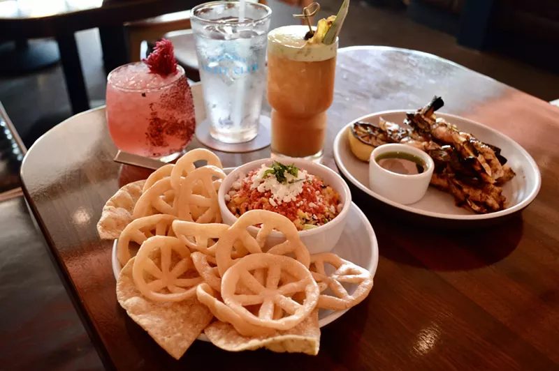 Image: Flamin' Hot elotes is served with chicharrones de harina at the new Suburban Yacht Club.
