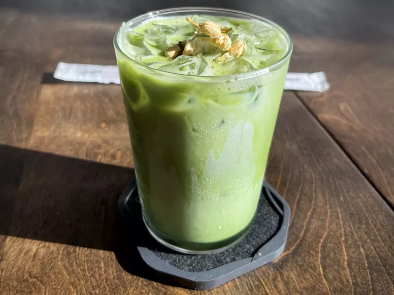 Image: The Jasmine Blossom: jasmine green tea, guest's choice of milk, jasmine syrup made from organic cane sugar, topped with dried jasmine blossoms.