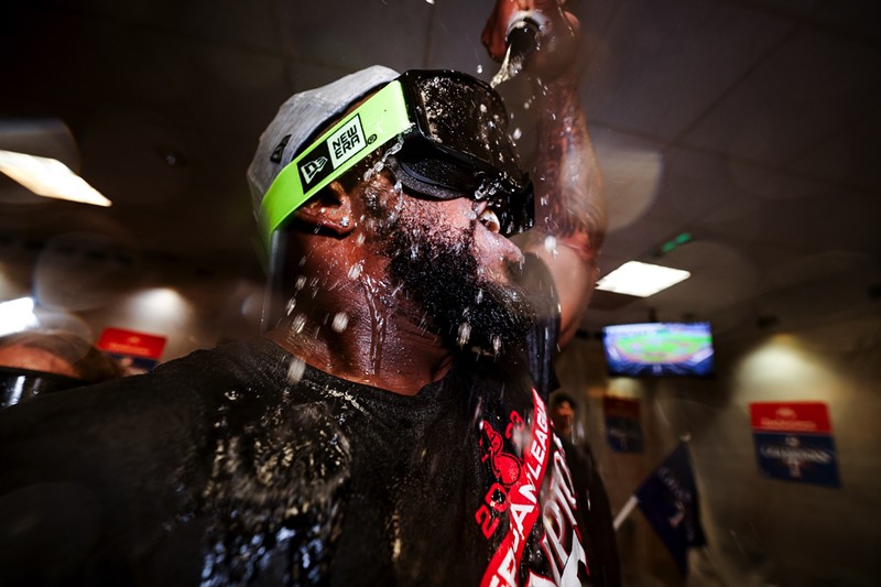 ALCS MVP Adolis Garcia of the Texas Rangers celebrates with his teammates after defeating the Houston Astros in Game 7 to win the American League Championship Series.