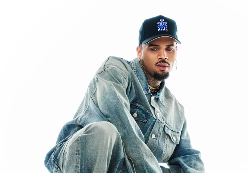 Image: Singer Chris Brown wears all-denim. The artist is playing