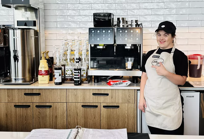 Image: Barista Bailey serving up coffee with a side of sass.