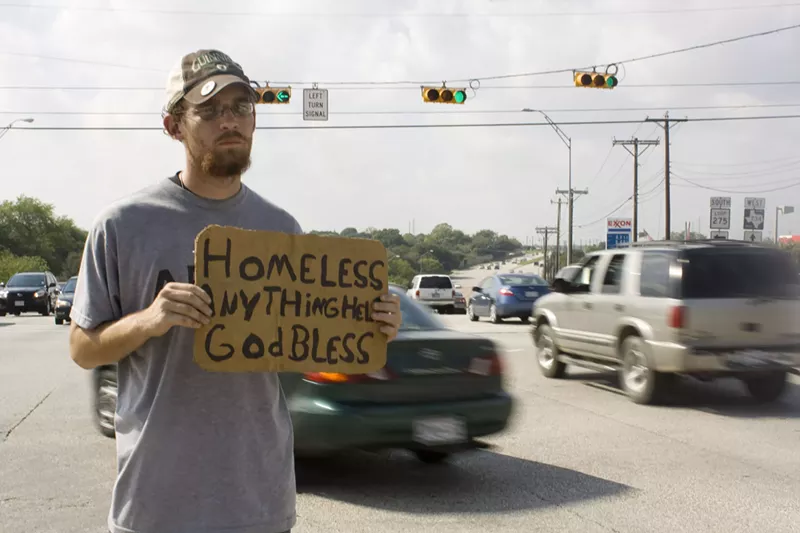Image: The new ordinance makes it a Class C misdemeanor punishable by a fine of up to $500 to stand on a Dallas median less than 6 feet wide.
