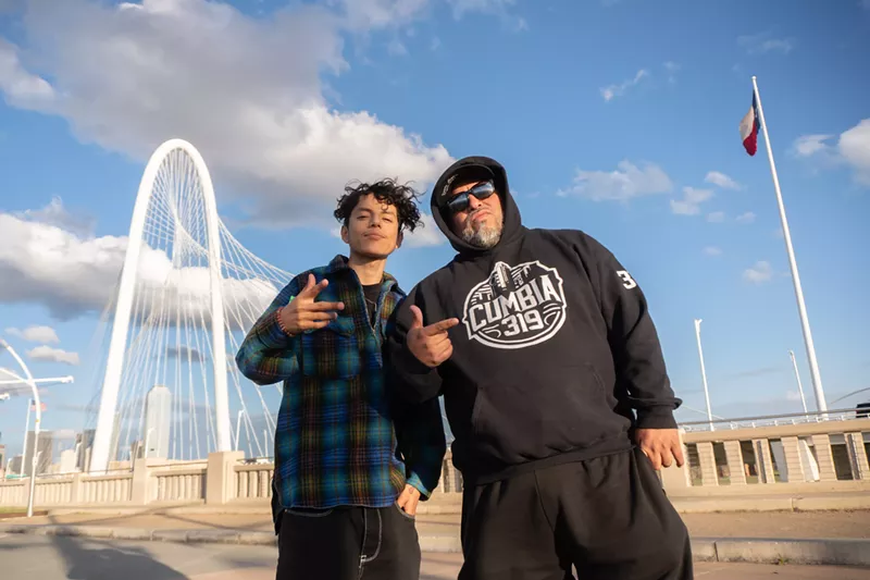 Image: Two guys posing for a picture