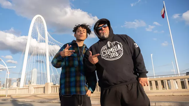 Two guys posing for a picture