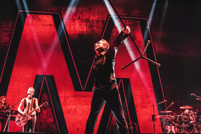 Image: Dave Gahan thrusted out the mic for the audience to sing along and made use of every part of the stage during Depeche Mode's set.