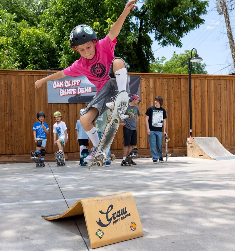 Image: Peter Baldwin, 10, does a jump trick at the Oak Cliff Skate Park community event in June 2025.