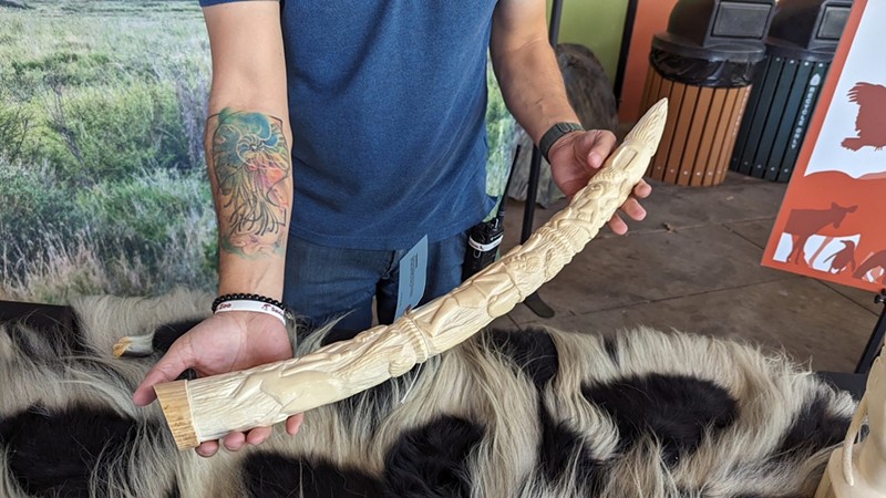 A carved ivory tusk collected at the Dallas Zoo's Toss the Tusk event this month.