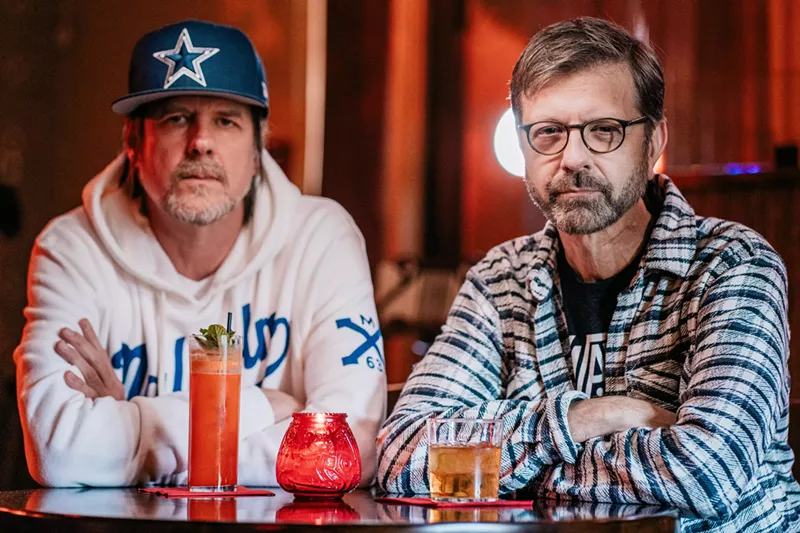 Image: Former Bastards of Soul bassist Danny Balis (left) and producer Jeff "Skin" Wade sit in a Dallas bar.