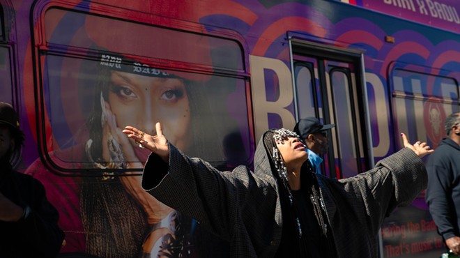Erykah Badu poses for the press in front of her very own Badu Bus, an initiative by DART to honor the Dallas singer.