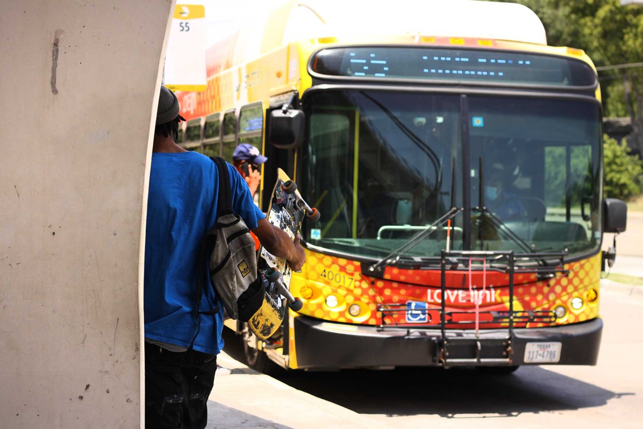 Passengers board a DART bus in Dallas.