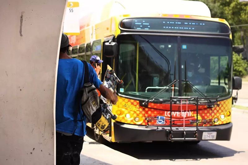 Image: Passengers board a DART bus in Dallas.