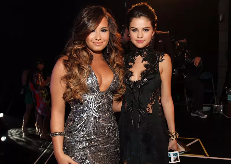 Image: Demi Lovato and Selena Gomez back when they were friends. Now they share one thing: millions of fake followers.