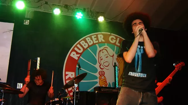 Two guys performing on stage