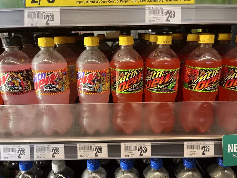 Image: Your eyes are not punishing you. Mountain Dew has a "Flaming Hot" flavor and before you ask, you did nothing wrong.