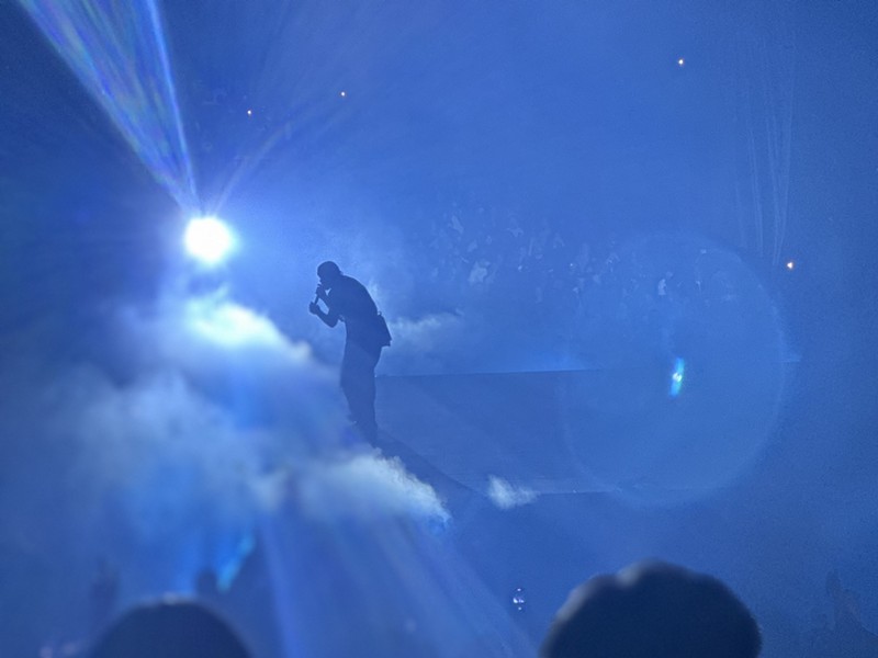 Drake performing at (and maybe pre-cursing) the American Airlines Center last year.