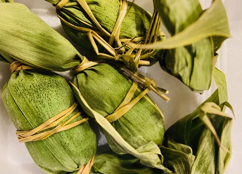 Image: The sasa dango comes wrapped in a sasa leaf (a broadleaf bamboo) for preservation and tied in a grass string