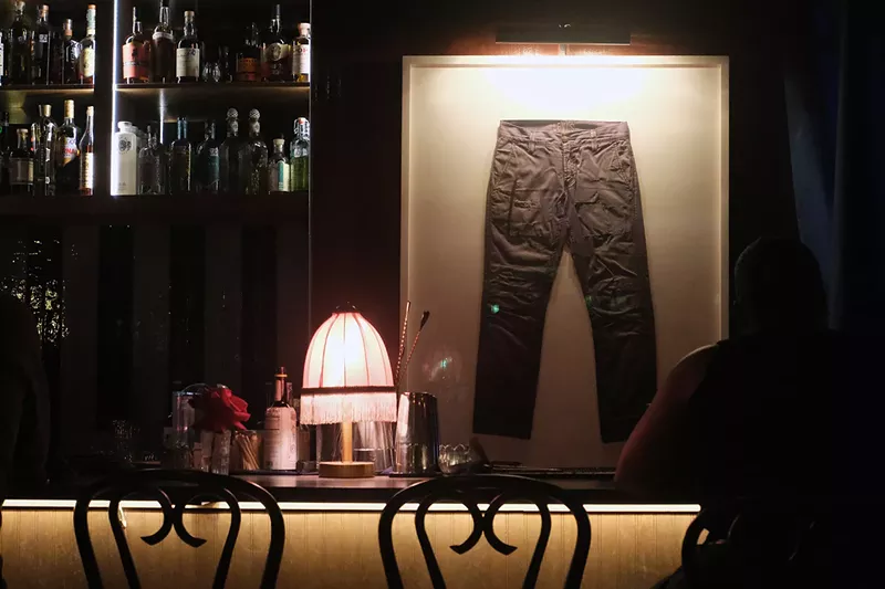 Image: Little Blue Bistro adds to the charm of Eighth Street, as seen in these framed Levi's by sculptor Travis LaMothe.