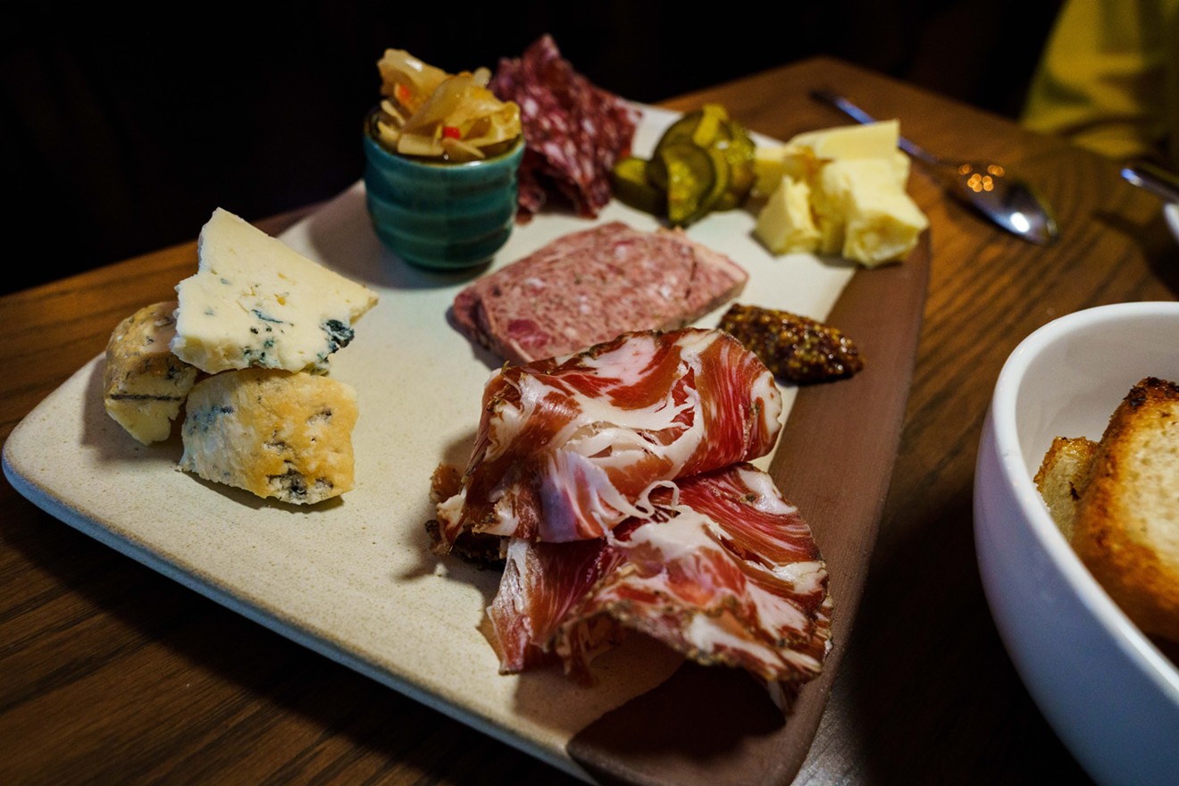 The charcuterie board comes with whole muscle, terrine, salumi and local cheese.