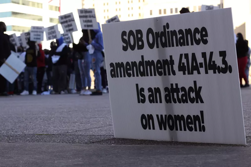 Image: Protesters outside Dallas City Hall in January chanted "crime knows no time" as city officials considered an ordinance that would close sexually oriented businesses in the early morning hours.