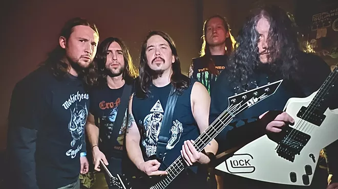 A band posing for a photo