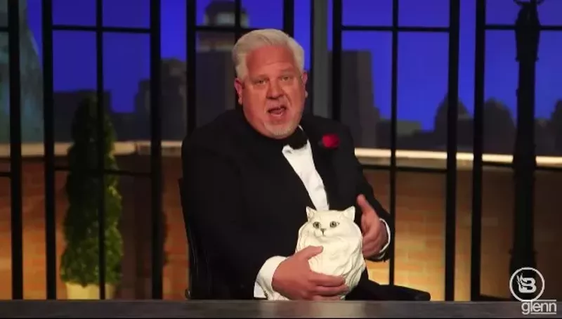 Image: Glenn Beck is doing an impersonation of someone here. We'll be generous and say it's of Marlon Brando in The Godfather. We guess. Lord knows, really.