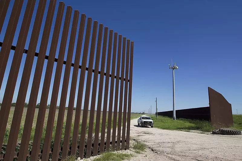 Image: Texas Gov. Greg Abbott has ramped up a row with the Biden administration over a spike in migrant arrivals