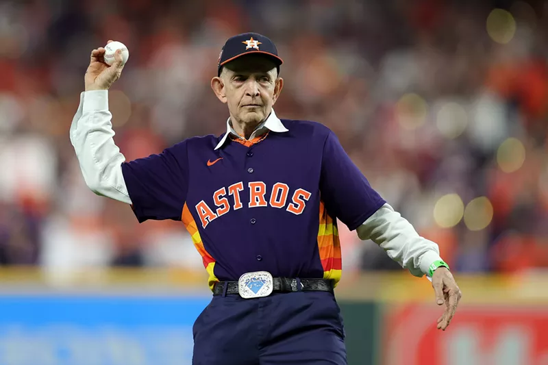 Image: Jim McIngvale throws out the first pitch prior to Game Six of the 2022 World Series at Minute Maid Park on Nov. 5, in Houston.