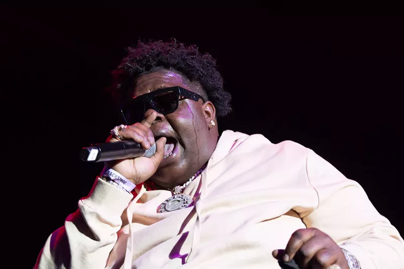 Image: BigX Tha Plug performing live. The rapper collaborated with fellow Dallas artist Ro$ama on a song for Godzilla x Kong: The New Empire.