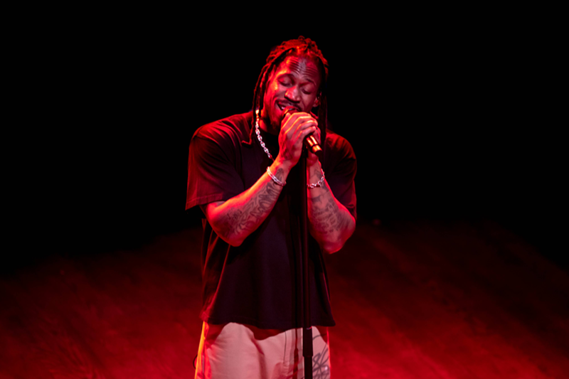 Image: Man performing on stage at House of Blues.