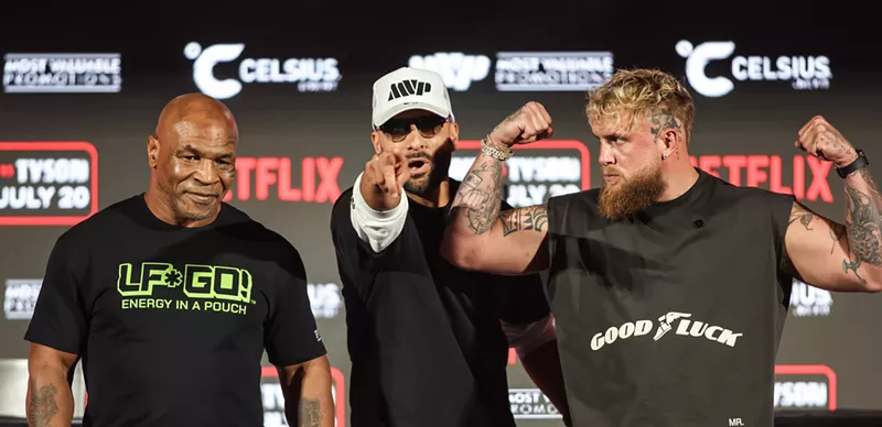 Image: Legendary boxer Mike Tyson (far left) held a press conference at Texas live! in Arlington against upcoming opponent Jake Paul (far right).