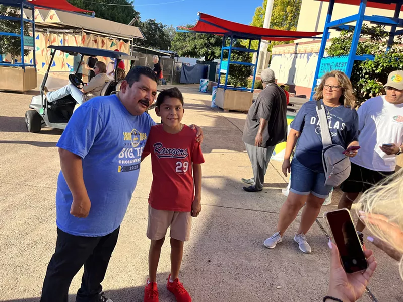 Image: Jimmy Kimmel Live sidekick Guillermo Rodriguez, left, takes a picture with Andy Cantu at Fair Park before his remote for Tuesday night's episode.