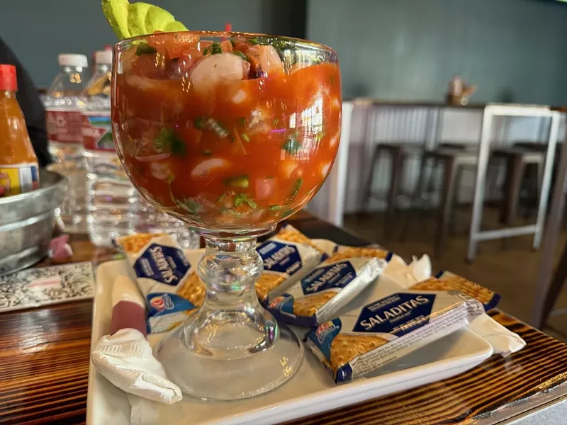 Image: Mexican shrimp cocktail at La Toxica Mariscos y Micheladas in Dallas' Deep Ellum neighborhood.