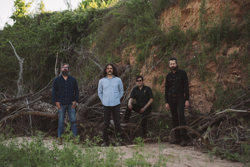 Image: Band posing in nature