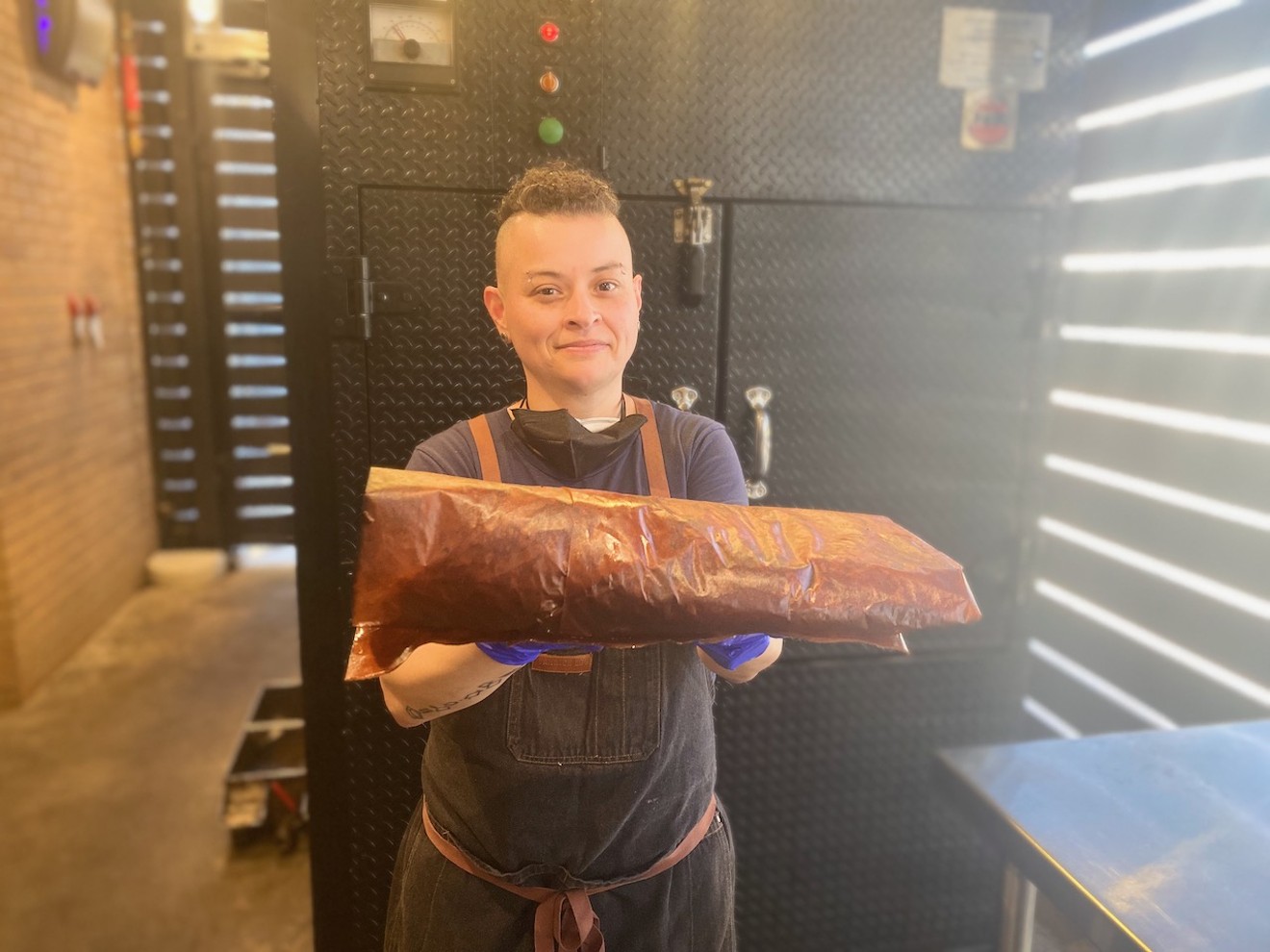 Chef Covarrubias trims, wraps, and smokes around 1,000 pounds of meat a week.
