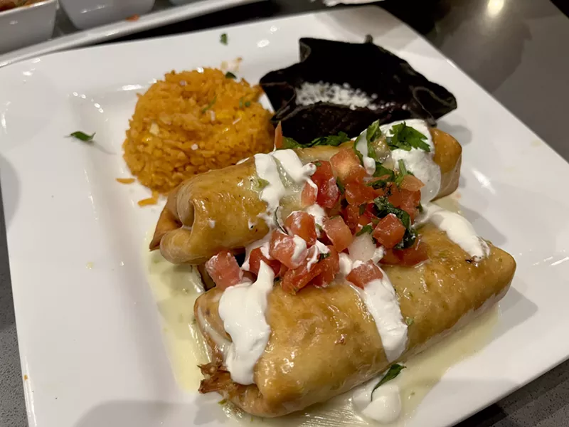 Image: The chimichanga plate comes with two deep-fried burritos filled with chicken or steak.
