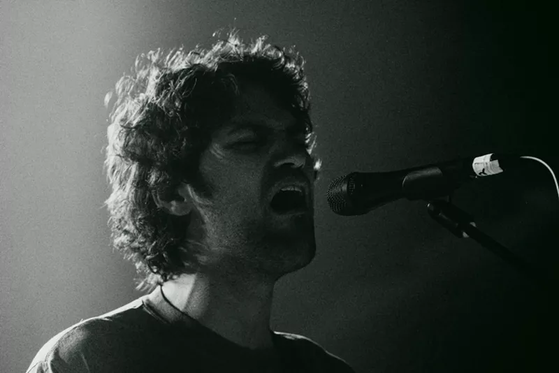Image: Man singing on stage
