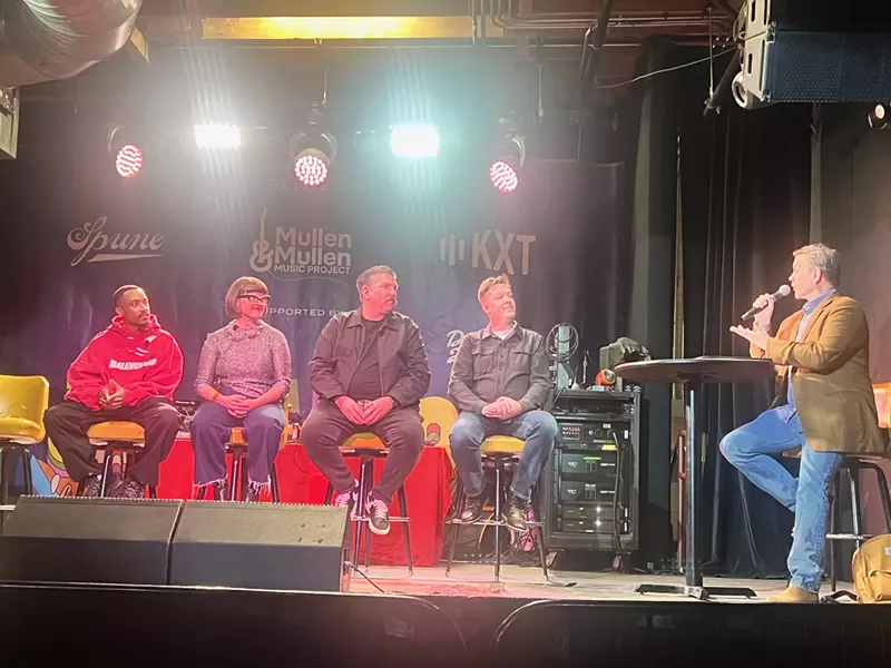 Image: From Left: Bobby Sessions, Kristina Kirkenaer-Hart, Tom Martens, Chip Adams and Benji McPhail speak during the Jambaloo Symposium.