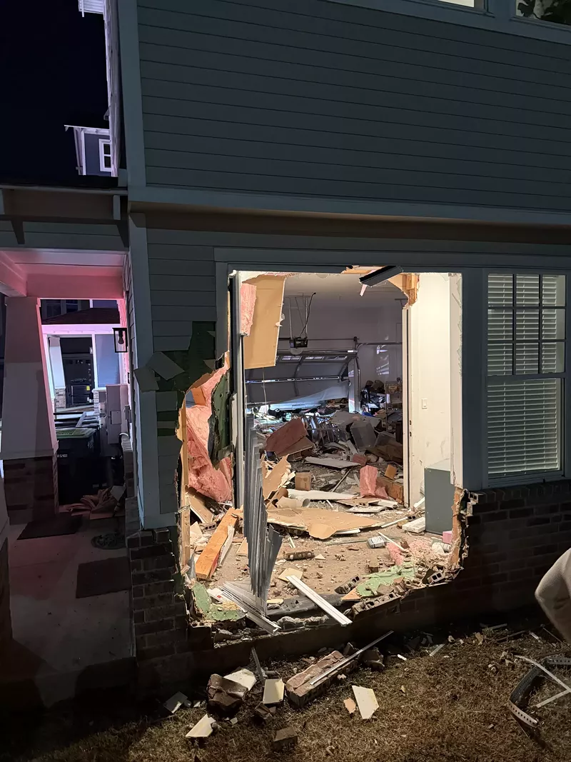 Image: In February, a car drove straight through the townhome, emerging on the opposite side.