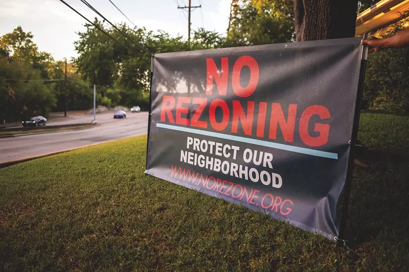 Image: Yesenia Serrano said North Boulevard Terrace neighbors will not be taking their yard signs down, even though Christian Chernock has withdrawn his zoning cases.