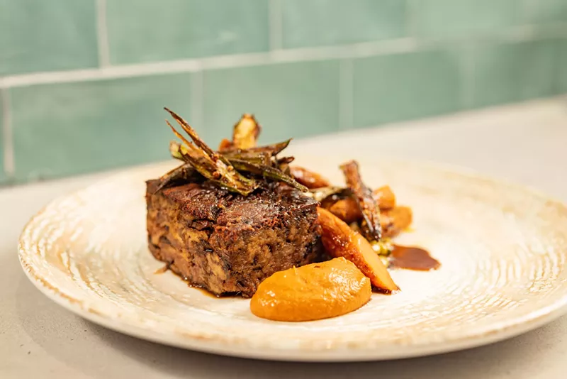 Image: The lamb pressé comes with a smoky and sweet muhammara dip.
