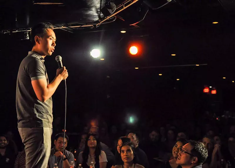 Image: Comedian Peng Dang performs a set at the Addison Improv. He'll headline a 9:30 pm show on Friday at the Stomping Ground Comedy Theater in Dallas.